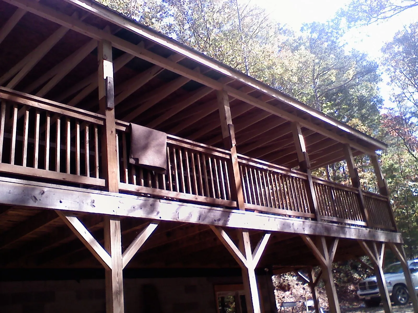 Timber framing under a new elevated porch and deck — Roof Leak Repair in Sioux Falls by Roofing Brothers